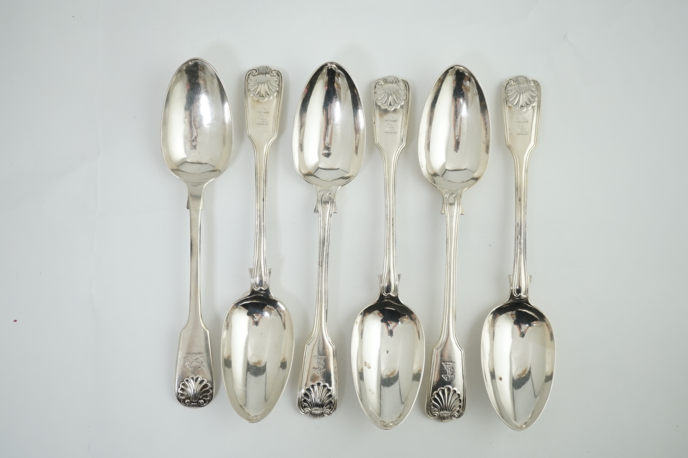 A set of five Victorian silver fiddle, thread and shell pattern table spoons, by Henry John Lias and James Wakely, London, 1879 and a Victorian fiddle and shell pattern table spoon, 1848